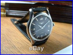 1960's LONGINES AUTOMATIC BLACK DIAL MANS VINTAGE WATCH black band KEEPING TIME