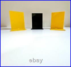 (3) unmarked plastic bookends like Kartell