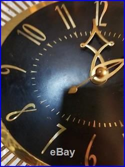 Retro atomic mid century metal starburst vintage g. E. Electric clock works