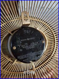 Retro atomic mid century metal starburst vintage g. E. Electric clock works