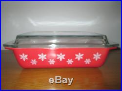 Vintage 1960s pink snowflake Pyrex dish with lid in perfect condition