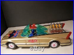Vintage Batman tin toy car gold rare Batmobile. WORKS LIGHTS, PISTONS VERY COOL