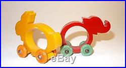 Vintage RARE Deco Bakelite Yellow Rabbit & Red Elephant Napkin Ring Green Wheels