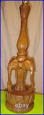 Vintage hand carved pair of imported elephant teak table lamps