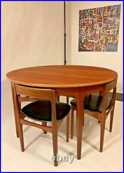 Vintage mid century teak extending dining table and chairs by Nathan furniture