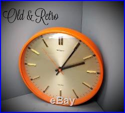 Vintage retro Metamec 1960-70's battery wall clock mid century orange convex